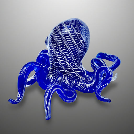 Blue glass octopus sculpture on a white background