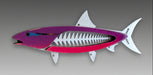 A mixed media sculpture of a bonefish with a primarily pink body and silver aluminum accents, mounted on a wall.