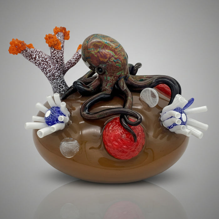 Decorative glass sculpture of an octopus and coral 