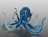 Blue glass octopus on a gray background