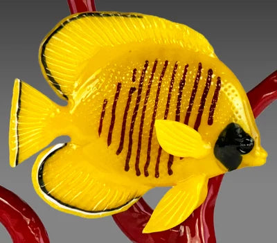 Gold Butterfly Fish on Red Coral Branch