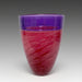 A blown glass vase with a pink and purple swirled pattern and an incalmo rim.