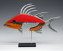A mixed media wall sculpture of a red hogfish with accents in silver and gold, featuring a coral reef-inspired stripe and crafted from materials including soft maple, aluminum, and epoxy.