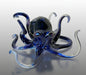 Glass octopus sculpture on a white background
