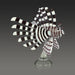 Glass sculpture of a lionfish with black and white striped pattern on a gray background