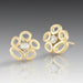 A pair of 18k yellow gold stud earrings with brilliant cut diamonds