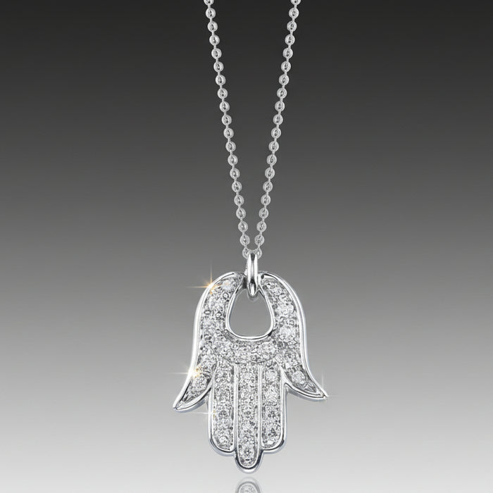 A Graffiti Hamsa Necklace with a pave setting of round, brilliant cut diamonds on a white gold or yellow gold chain.