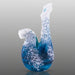 Blue and white glass sculpture on a gray background