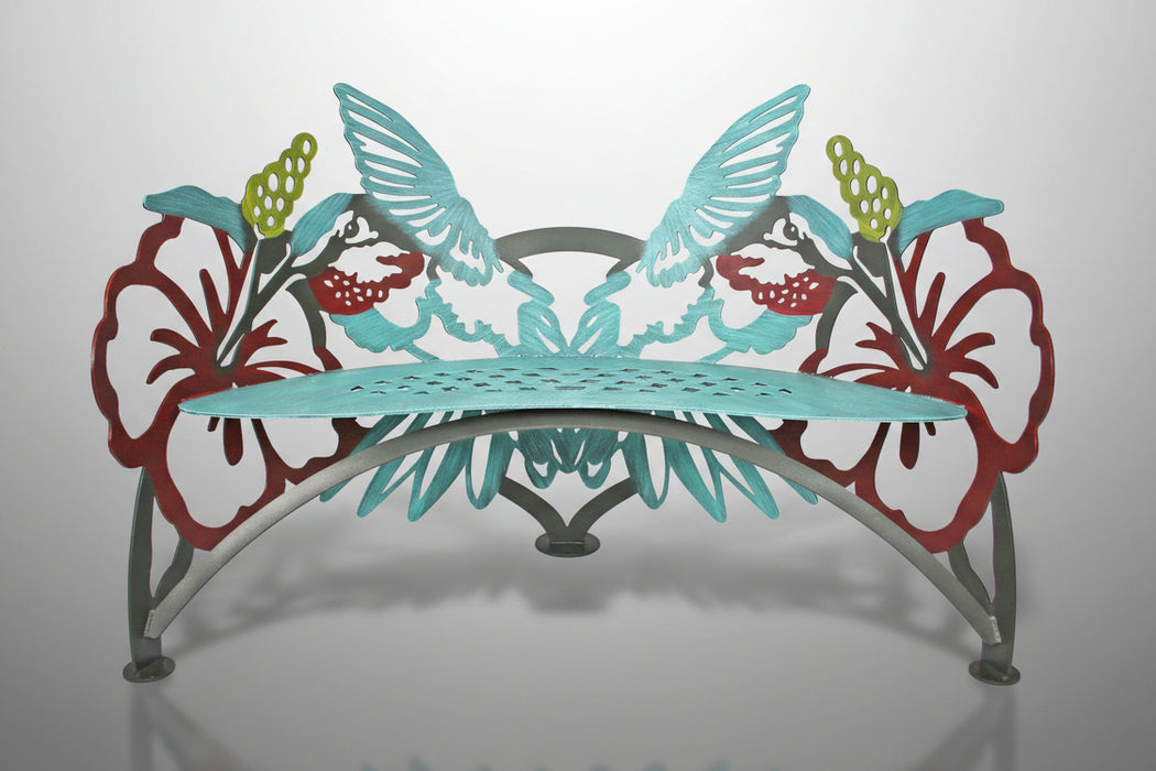 A metal hummingbird bench with a marine-grade epoxy base and hand-applied dry-brush accents, featuring a flame-sprayed zinc layer for outdoor longevity.