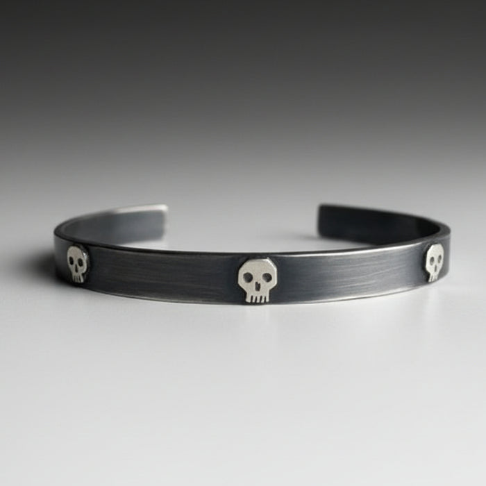 Five Skull Oxidized Silver Cuff